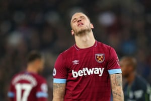 Sinking feeling: Marko Arnautović sighs as West Ham United are beaten 4-0 by Manchester City