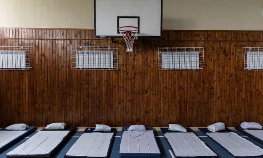 Beds for evacuee children are seen at an empty gymnasium of a local school in Sloviansk, Donetsk region.