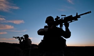 US Navy Seals training for desert combat.