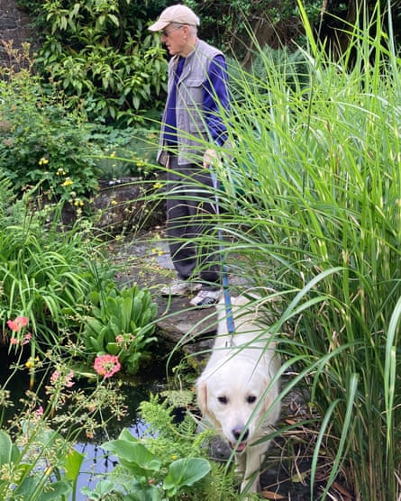 Paul Brown with his dog, Tasha, in Ardmaddy Gardens, Oban, Scotland, July 2023
