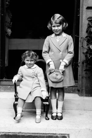 1933: Princess Margaret, two, with her sister Elizabeth, seven