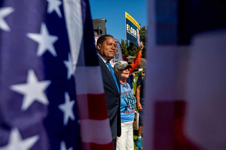 Gavin Newsom’s political fate in balance as polls close in California recall | Gavin Newsom 4 Larry Elder campaigns in Los Angeles ahead of the recall.
