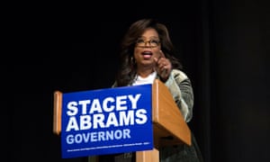Oprah Winfrey takes part in a town hall meeting with the Democratic gubernatorial candidate Stacey Abrams ahead of the midterm election in Marietta, Georgia, on Thursday.