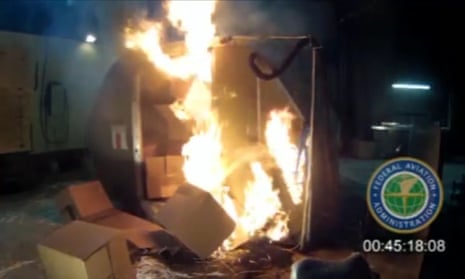 Frame from a Federal Aviation Administration (FAA) video showing a fire in a cargo container of 5,000 rechargeable lithium-ion batteries.