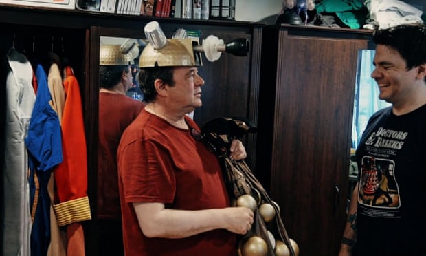 Matthew Jacobs gets to try on bits of a Dalek costume during the documentary