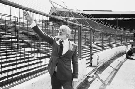 Ken Bates showing off the new electric fence erected at Stamford Bridge in 1985 after a series of pitch invasions.