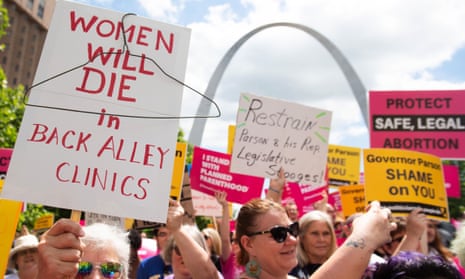 Protesters rally in support of Planned Parenthood and pro-choice in St Louis, Missouri, on 30 May. 
