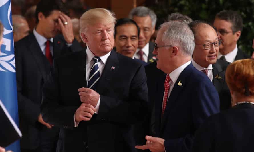Trump and Turnbull in suits talking at an event