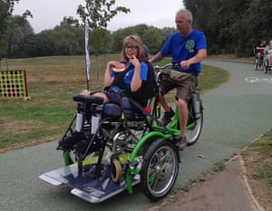 Imogen takes a ride on one of the adjusted bikes at Cycall.