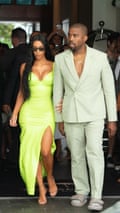 ‘The swagger of streetwear meets the more traditional world of tailoring’ … Kanye West in a mint green, oversized Louis Vuitton double-breasted suit with no shirt and slide sandals
