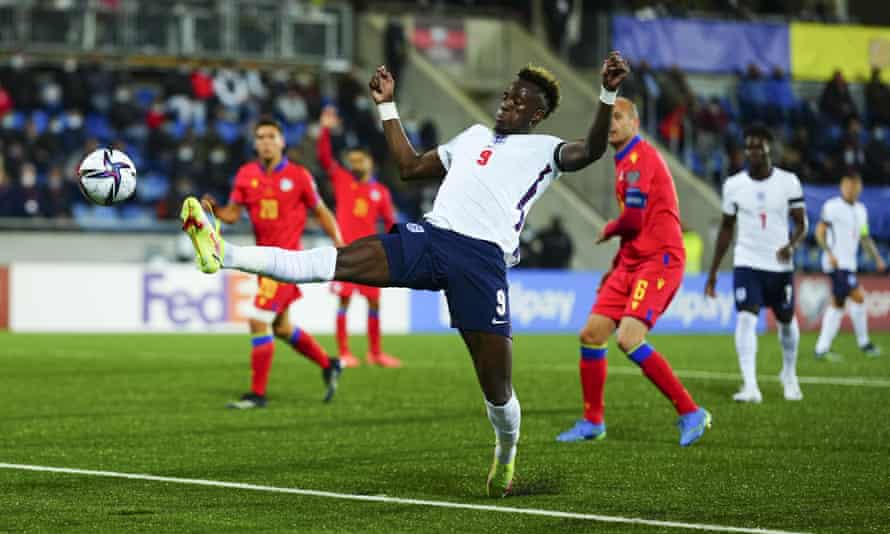 Tammy Abraham stretches to score England’s third goal from close range against Andorra.