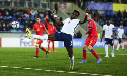Tammy Abraham stretches to score England’s third goal from close range against Andorra.