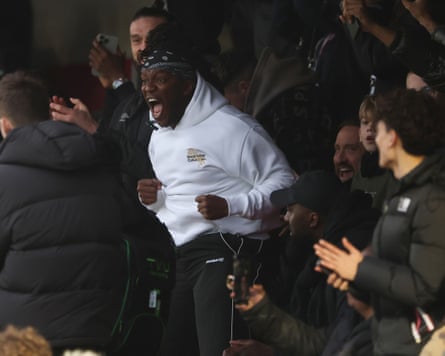 KSI, influencer and minority shareholder at Dagenham & Rebdridge, celebrates with Dagenham fans during their 1-0 win against Dorking in National League South.