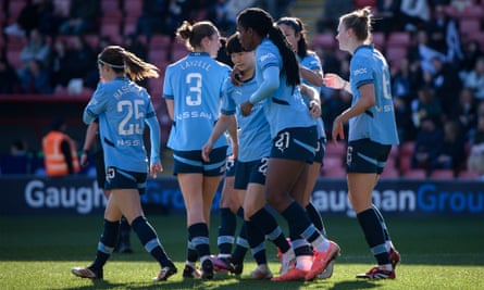 Manchester City players celebrate Vivianne Miedema (right) scoring against Tottenham.
