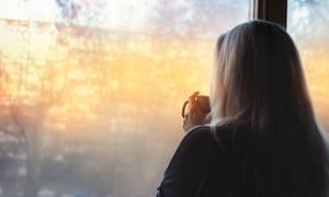 Woman standing by the window