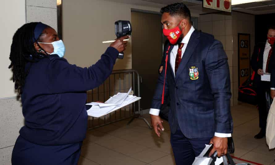 Bundee Aki's temperature is checked upon arrival in South Africa.