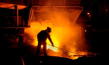 Team member taking iron samples using a lance on Blast Furnace No 5 at Tata Corus Steelworks Port Talbot