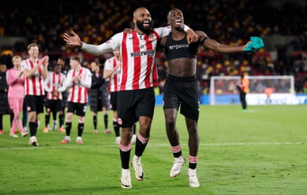Igor Thiago and Rico Henry celebrate after Brentford’s win against Liverpool