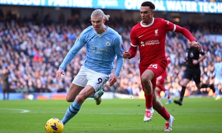 Manchester City’s Erling Haaland and Liverpool’s Trent Alexander-Arnold battle for the ball during the draw at the Etihad Stadium in November 2023.