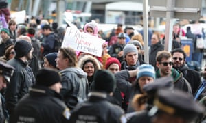 People protest against Donald Trump’s executive order banning entry of citizens from seven Muslim-majority countries, outside the Terminal 4 at John F Kennedy International Airport in New York, in January.