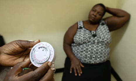 A woman has her BMI checked at a hospital in Nairobi, Kenya.