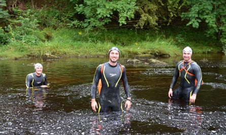 Calum Hudson (centre) in the river Eden with his brothers Jack (left) and Robbie (right)