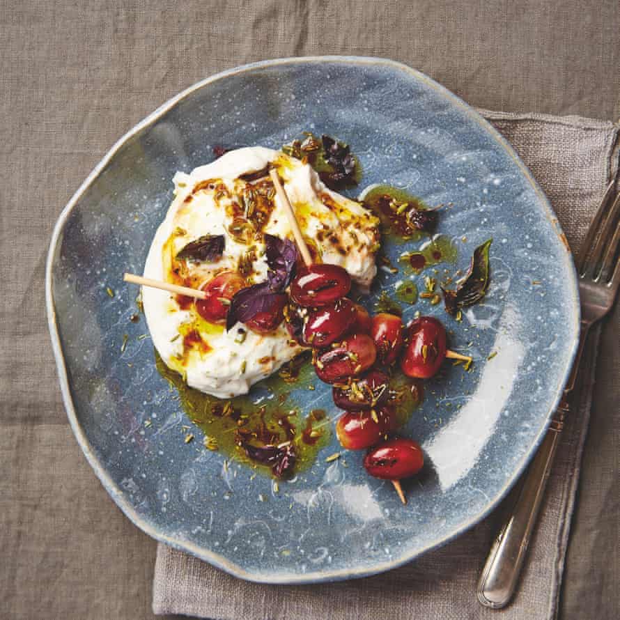 Charred grapes accompany the creamy burrata.