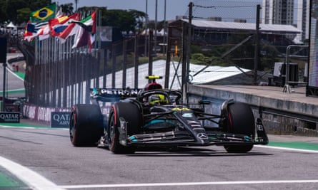 Lewis Hamilton drives his Mercedes car on to the Interlagos track.