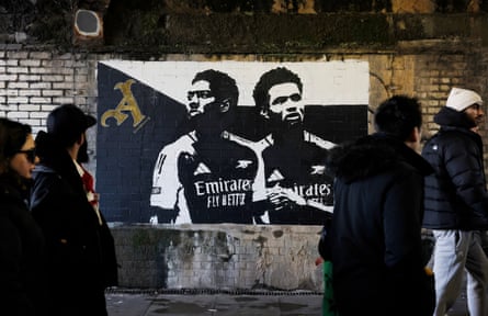 A mural of Arsenal academy players Myles Lewis-Skelly and Ethan Nwaneri in a tunnel near the stadium before the Premier League match in which they both scored between Arsenal and Manchester City at the Emirates Stadium on 2 February 2025.