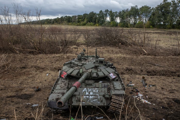 Damaged tank in a field