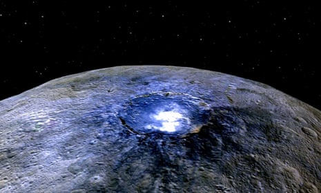 A representation of Ceres’s Occator crater shows bright spots pocking the surface of the dwarf planet.