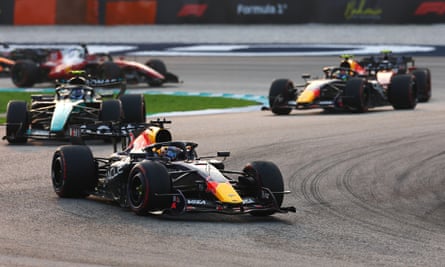 Max Verstappen driving ahead of Mercedesâ Kimi Antonelli and his Red Bull teammate Isack Hadjar.