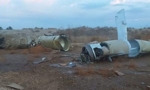 Pieces of missiles near al-Asad airbase