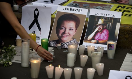 A memorial for murdered journalists Miroslava Breach, left, and Javier Valdez, who were killed in separate attacks in Mexico in 2017.