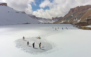 Members of the Bamyan Ski Club enjoy a day of ice-skating and football on a frozen lake in Band-e-Amir.