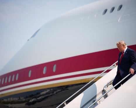 Donald Trump disembarks from Air Force One as he arrives in Bismarck, North Dakota.