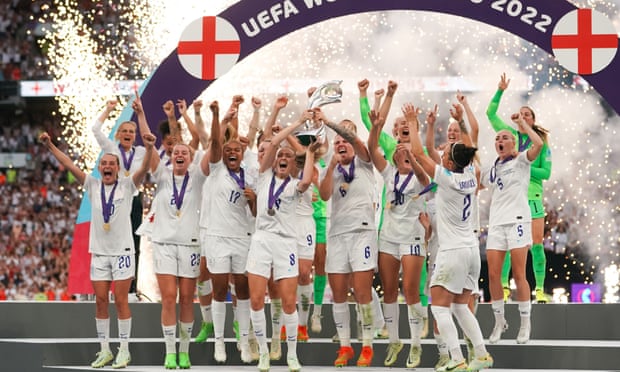 The Lionesses celebrate victory.