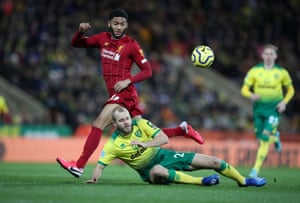 Norwich City’s Teemu Pukki in action with Liverpool’s Joe Gomez.