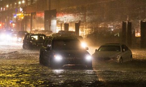 Cars stuck on a street as remnants of Hurricane Ida hit Queens, New York, on 1 September 2021.