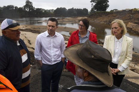 Labor campaign spokesperson Jason Clare, shadow finance Minister Katy Gallagher and Labor member for the seat of Macquarie, Susan Templeman, speak to local farmers as they inspect flood damaged Cornwallis Rd near Richmond.
