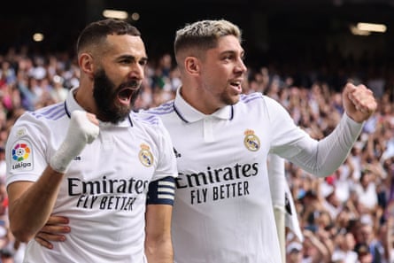 Real Madrid’s Karim Benzema (left) celebrates with Federico Valverde after scoring the first goal after 12 minutes.