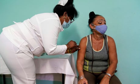 People receive booster doses of the Abdala vaccine against the coronavirus disease (COVID-19), in Havana<br>A woman receives a booster dose of the Abdala vaccine amid the spread of the coronavirus disease (COVID-19), in Havana, Cuba December 6, 2021. REUTERS/Natalia Favre NO RESALES. NO ARCHIVES