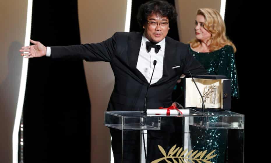 Parasite director Bong Joon-ho with Catherine Deneuve at the Cannes closing ceremony in 2019.