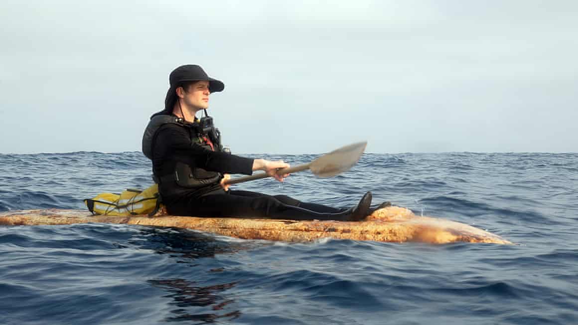 Sam Shoemaker in a kayak made entirely from mushrooms in the waters off Catalina Island.