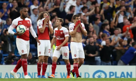 Arsenal’s players react in frustration after their comeback was thwarted by Marcos Alonso’s late winner.