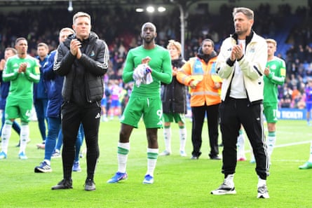 Eddie Howe and Jason Tindall applaud the Newcastle fans at Selhurst Park