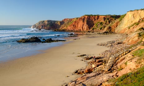 The Algarve’s western coast is studded with sandy beaches. Pictured is Praia do Amado.