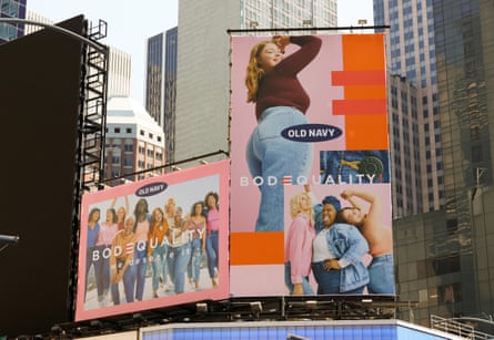 A body equality billboard shows models of plus and straight sizes