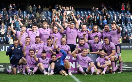 Scotland’s Jamie Richie (centre) lifts the Cuttitta Cup with team-mates after victory against Italy