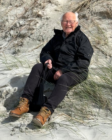 David Gow posing for a pic on a sand dune